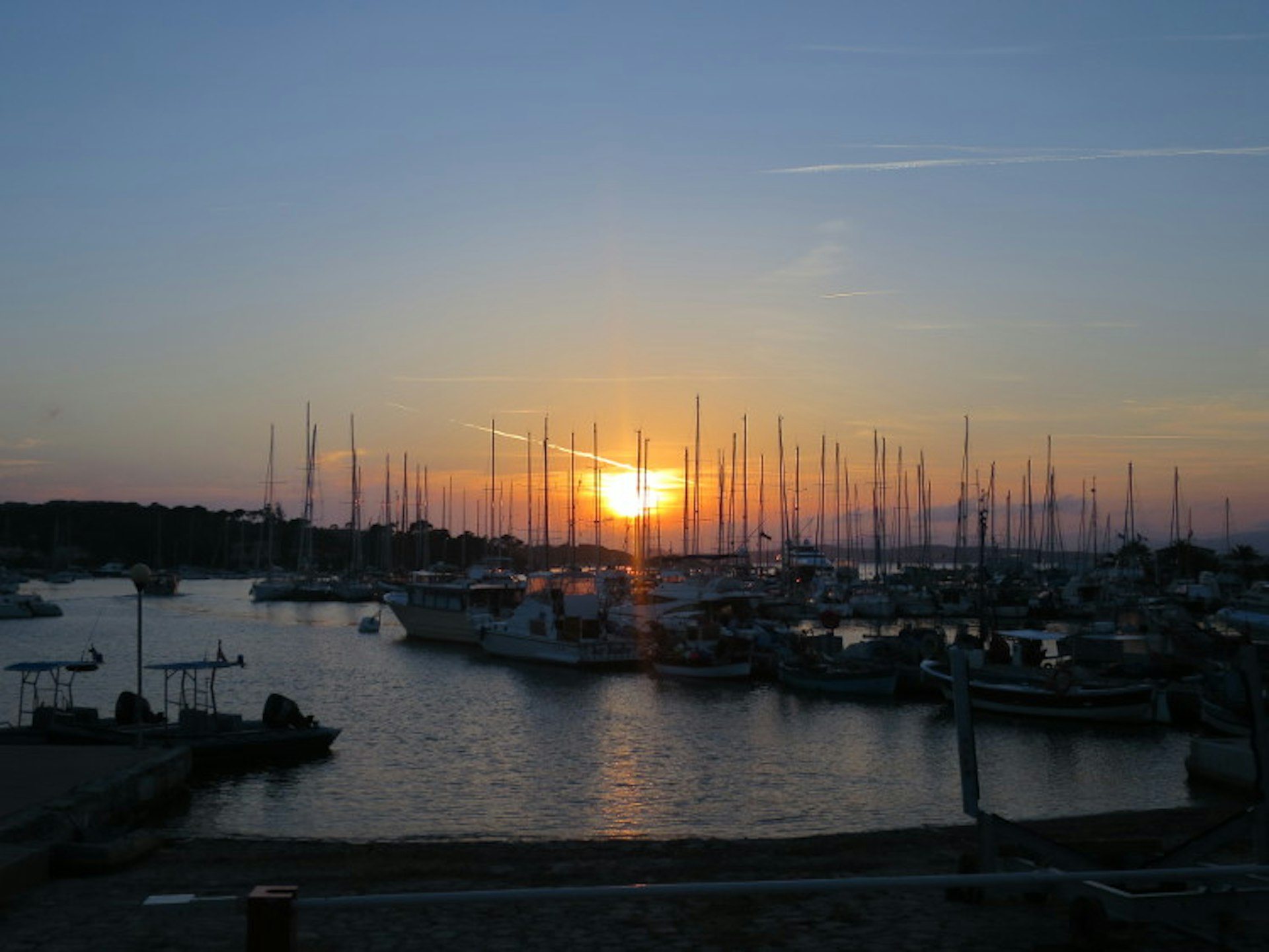 Sunset across the marina: Île de Porquerolles . Image by Karyn Noble/Lonely Planet