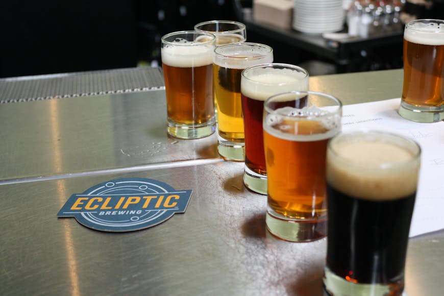 A flight of beers at astronomically good Ecliptic Brewing. Image by Alexander Howard / Lonely Planet