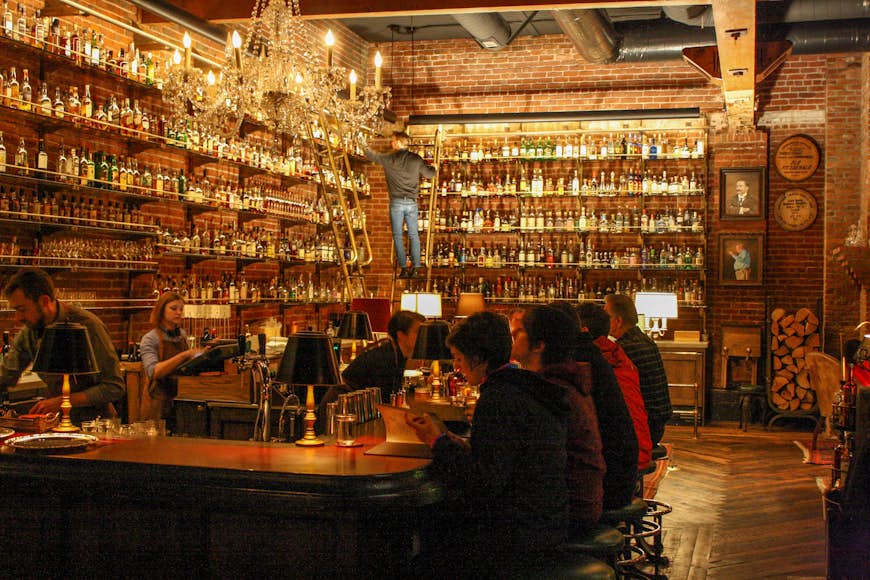 Over 1500 spirits are available at Multnomah Whiskey Library. Image by Alexander Howard / Lonely Planet