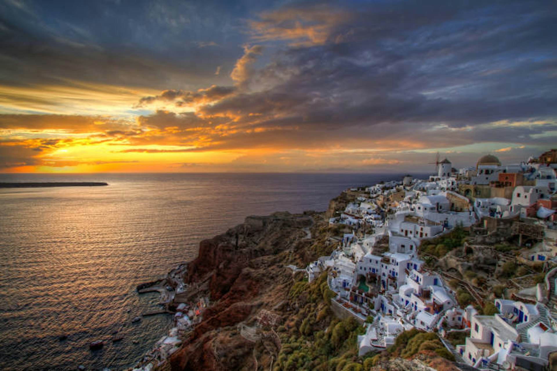 The famous Santorini sunset is reason enough to go to Greece. Image by Nikola Totuhov / CC BY-SA 2.0