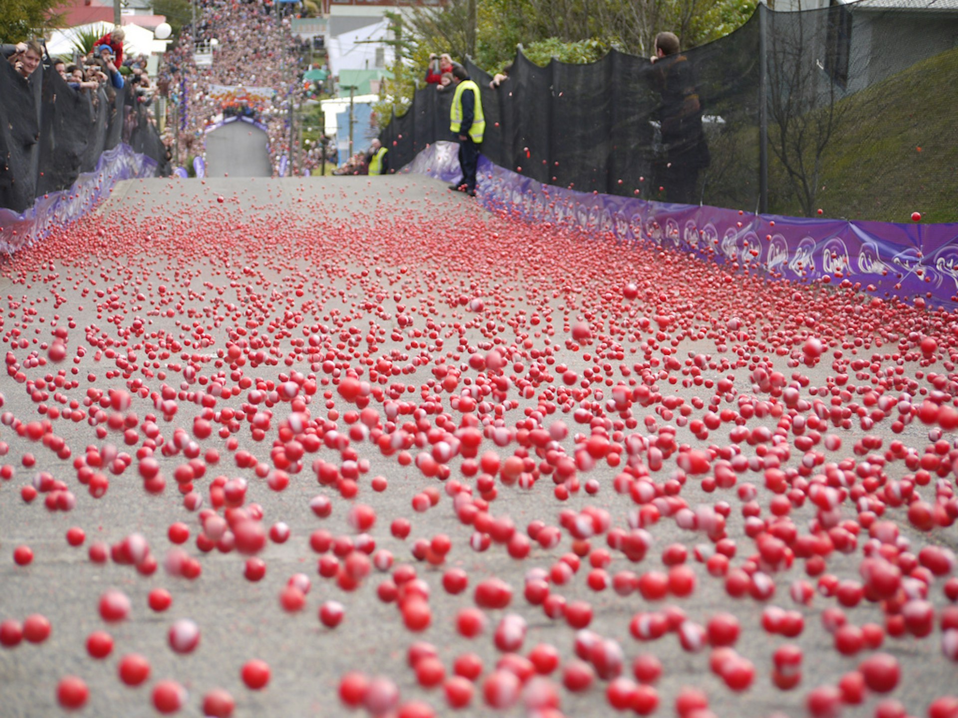 Racing Jaffas (red coated confectionery) down the world's tallest street in Dunedin. Image by Dunedin NZ / CC BY ND 2.0