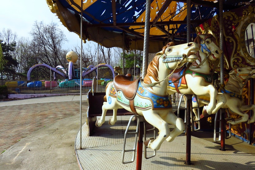 Creepy delights: carousel and octopus rides at the abandoned Yongma Land amusement park. Image by Phillip Tang / Lonely Planet