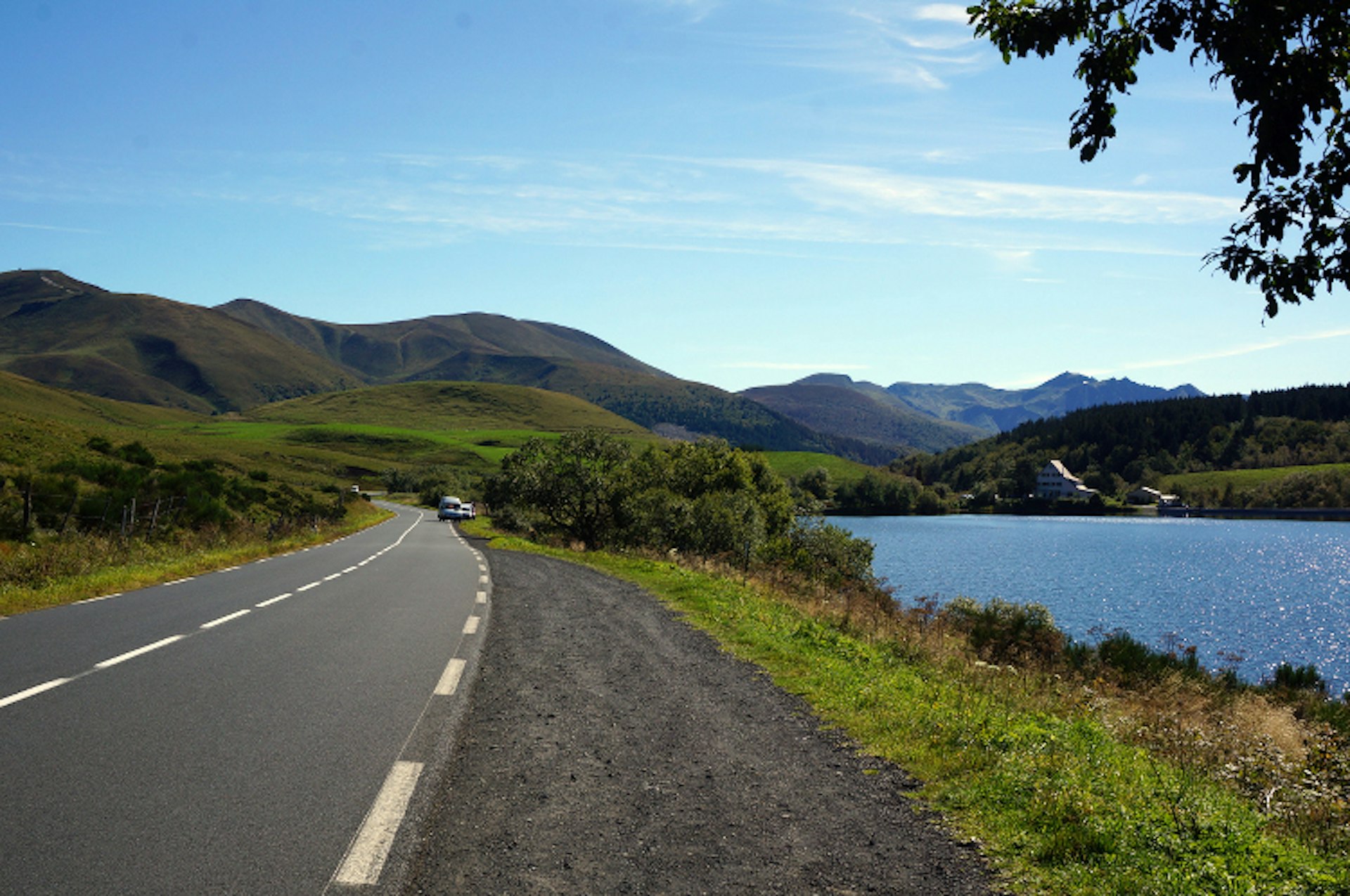 A foodie road trip in the Auvergne bypasses volcano-carved terrain like deep valleys and tranquil Lac de Guéry. Image by Anita Isalska