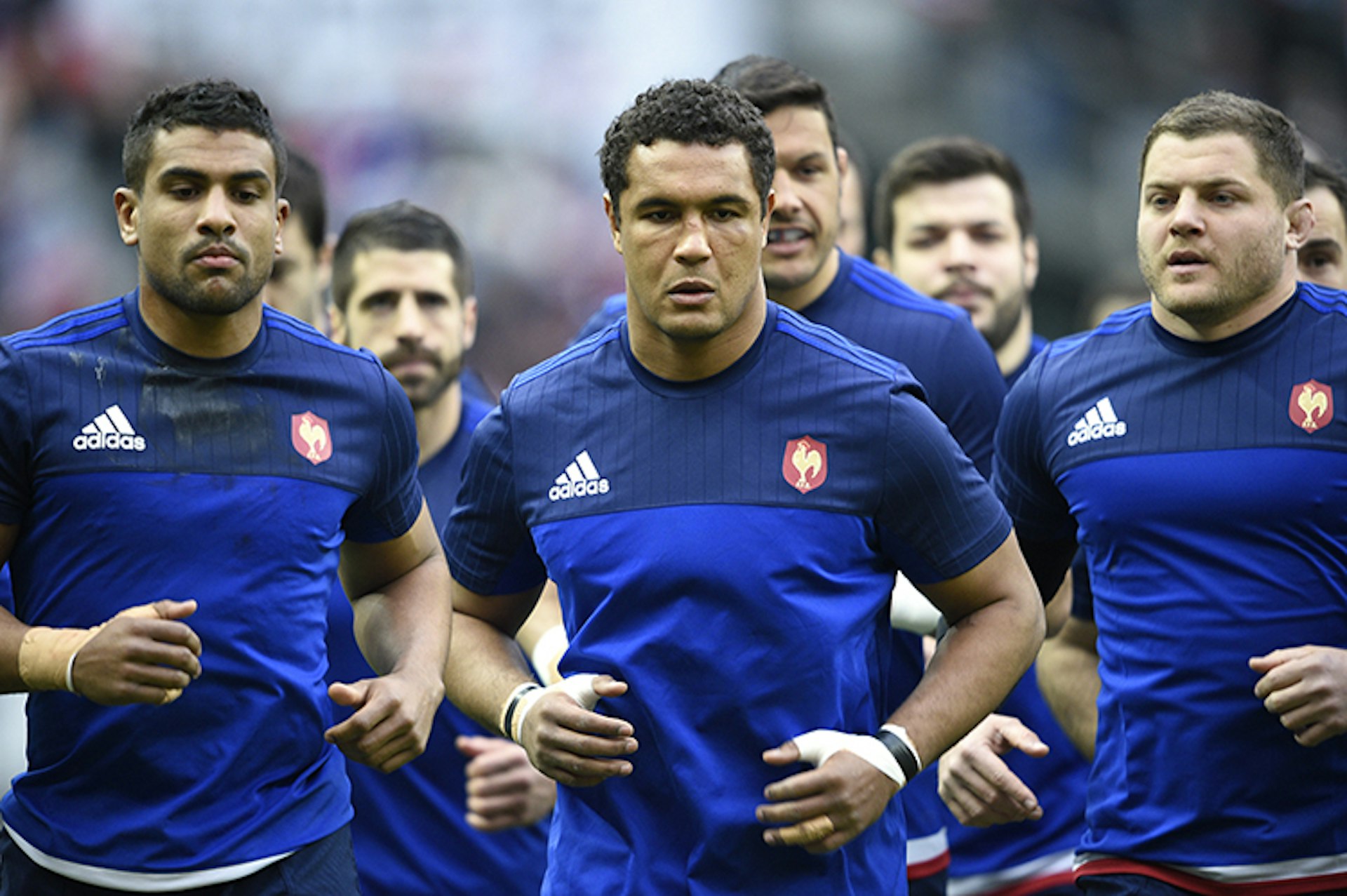 Members of the French rugby squad warming up before a match at the Stade de France, Paris. 