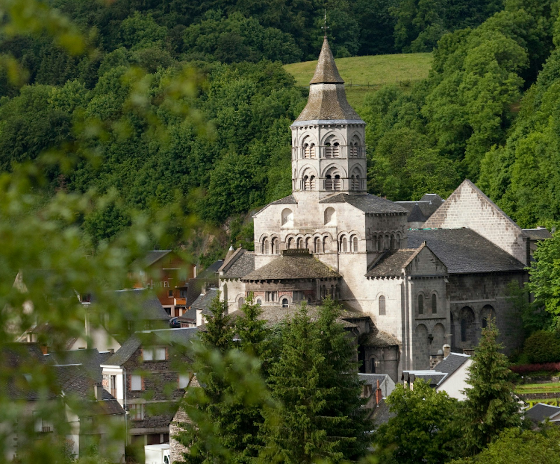 <span class="caption">The Romanesque Basilique Notre Dame dominates the tiny town of Orcival. Image by Cultura RM/Philip Lee Harvey/Photostock Getty</span>