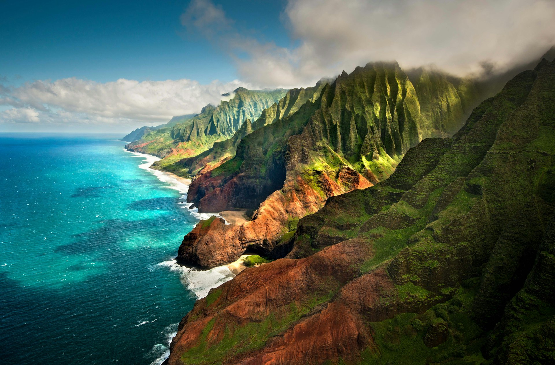 The rugged cliffs of the Na Pali Coast. Image by Cultura RM/George Karbus Photography / Getty