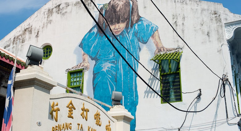 Kungfu Girl, one of the more popular street art pieces in George Town, Penang, by Lithuanian street artist Ernest Zacharevic. Image by Lonely Planet
