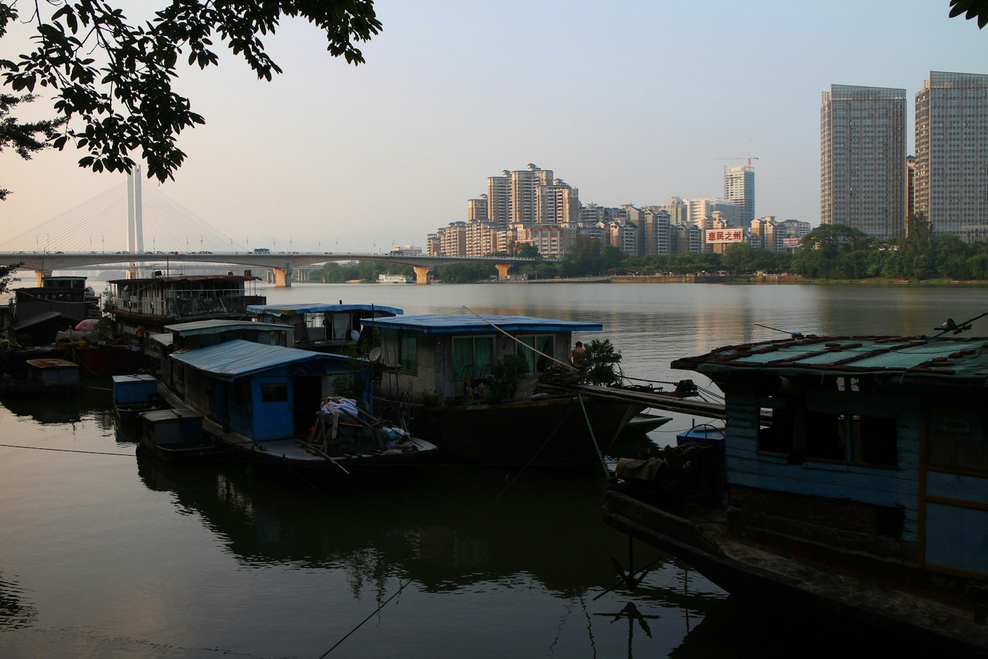 Old vs new: looking across the Dong River to Huizhou's new Jiangbei district. Image by Thomas Bird / Lonely Planet