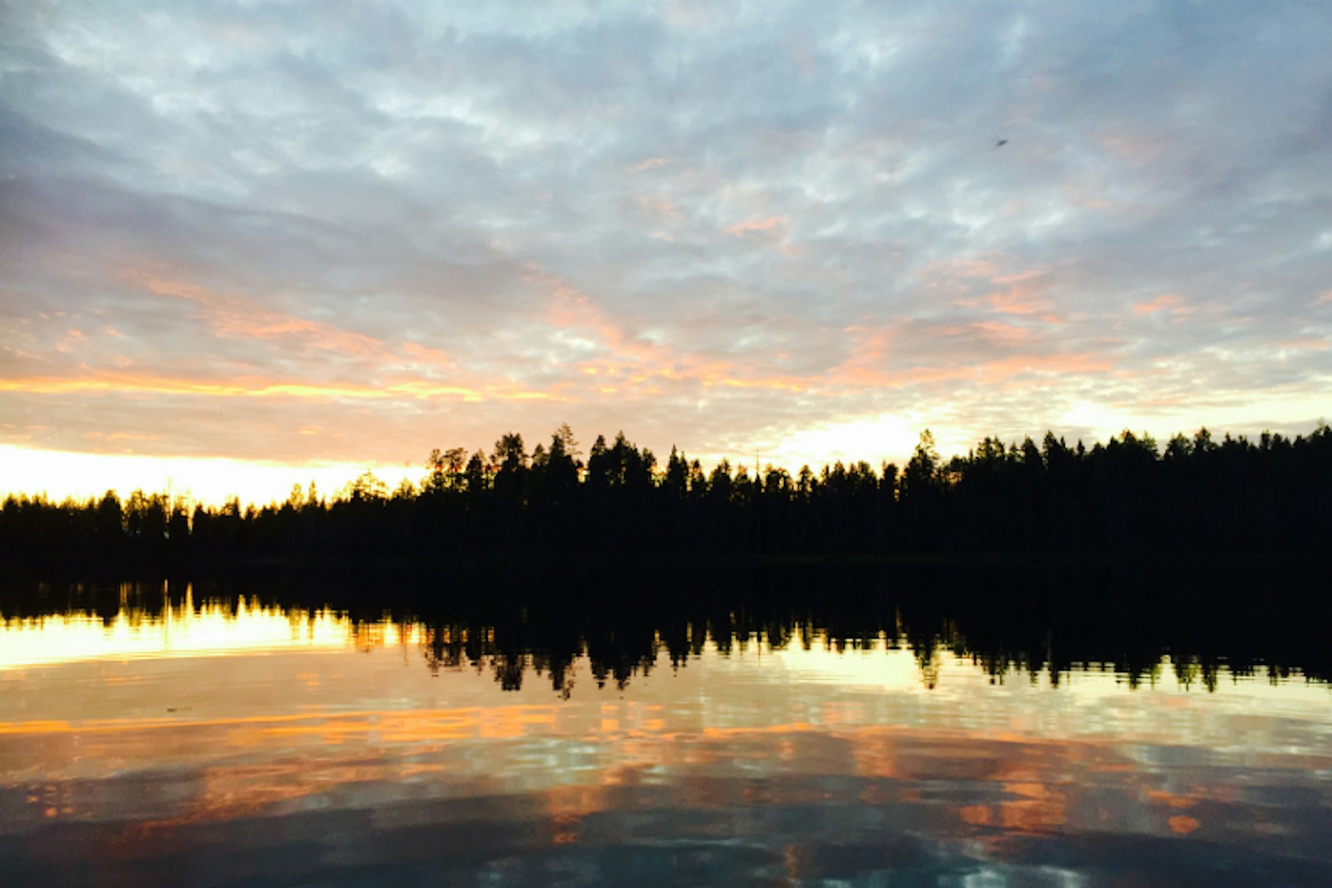 lake-mirrors-near-setting-sun