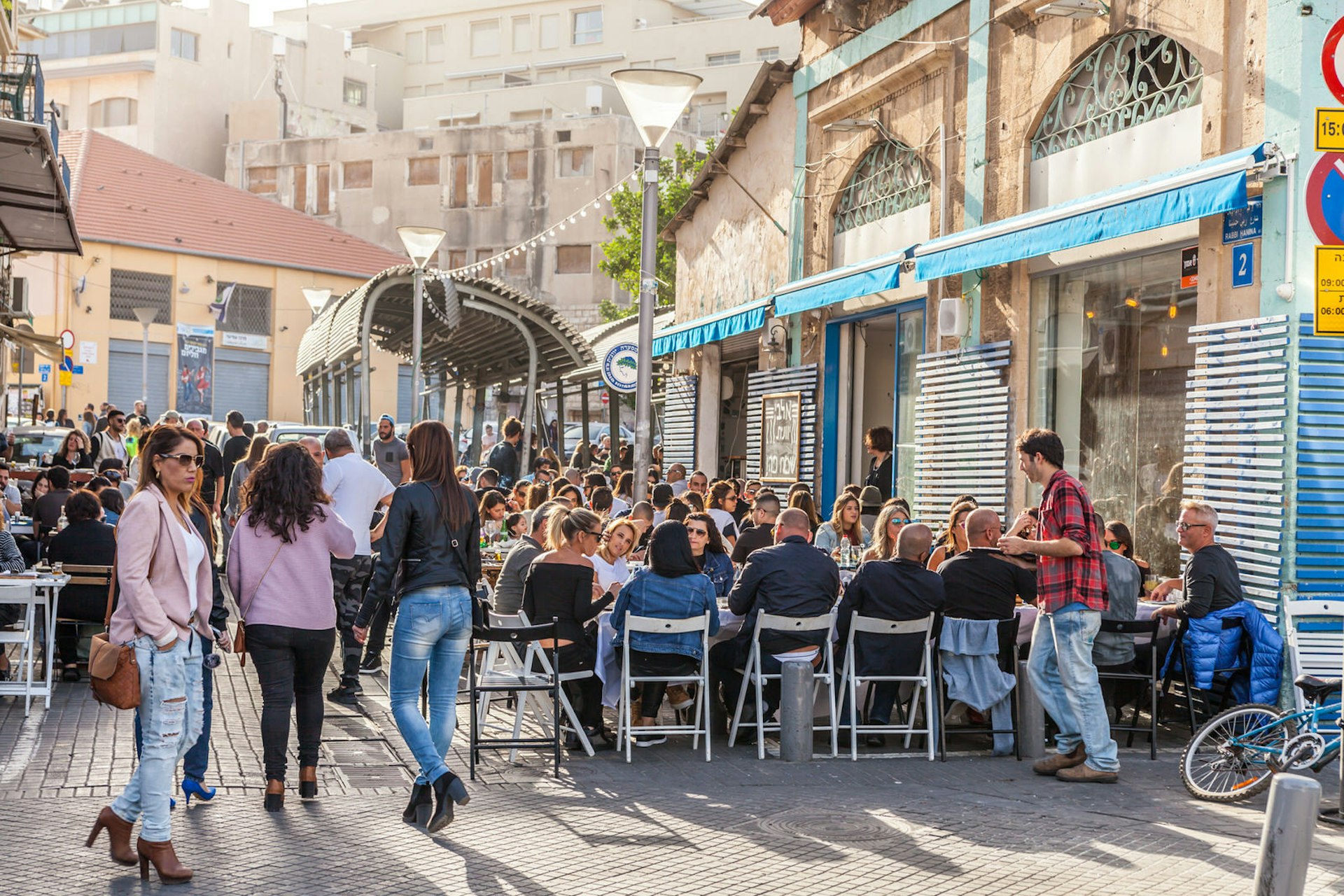 Bustling street cafe in the Arab quarter of Jaffa, Tel Aviv. Image by Kvitka Fabian / Shutterstock