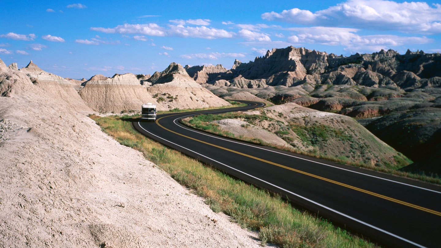 A road through Badlands National Park. Image by Holger Leue / Lonely Planet Images / Getty