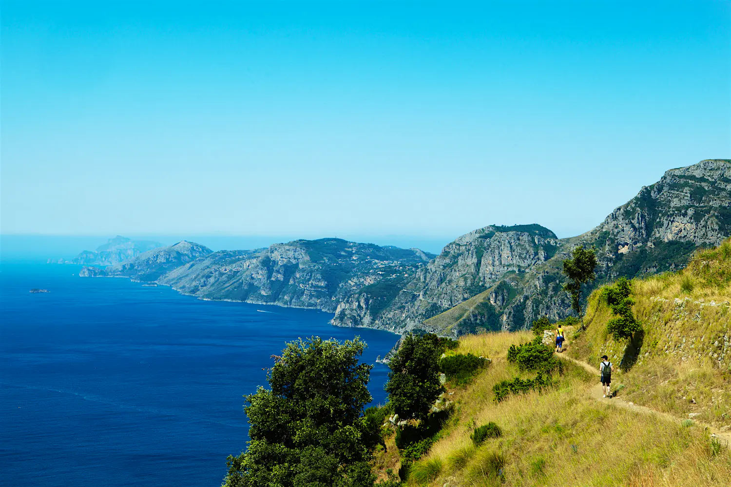 Sentiero Degli Dei (Path of the Gods) Hikers on Sentiero degli Dei (Path of the Gods), which provides incredible views of the Amalfi Coast and the island of Capri.