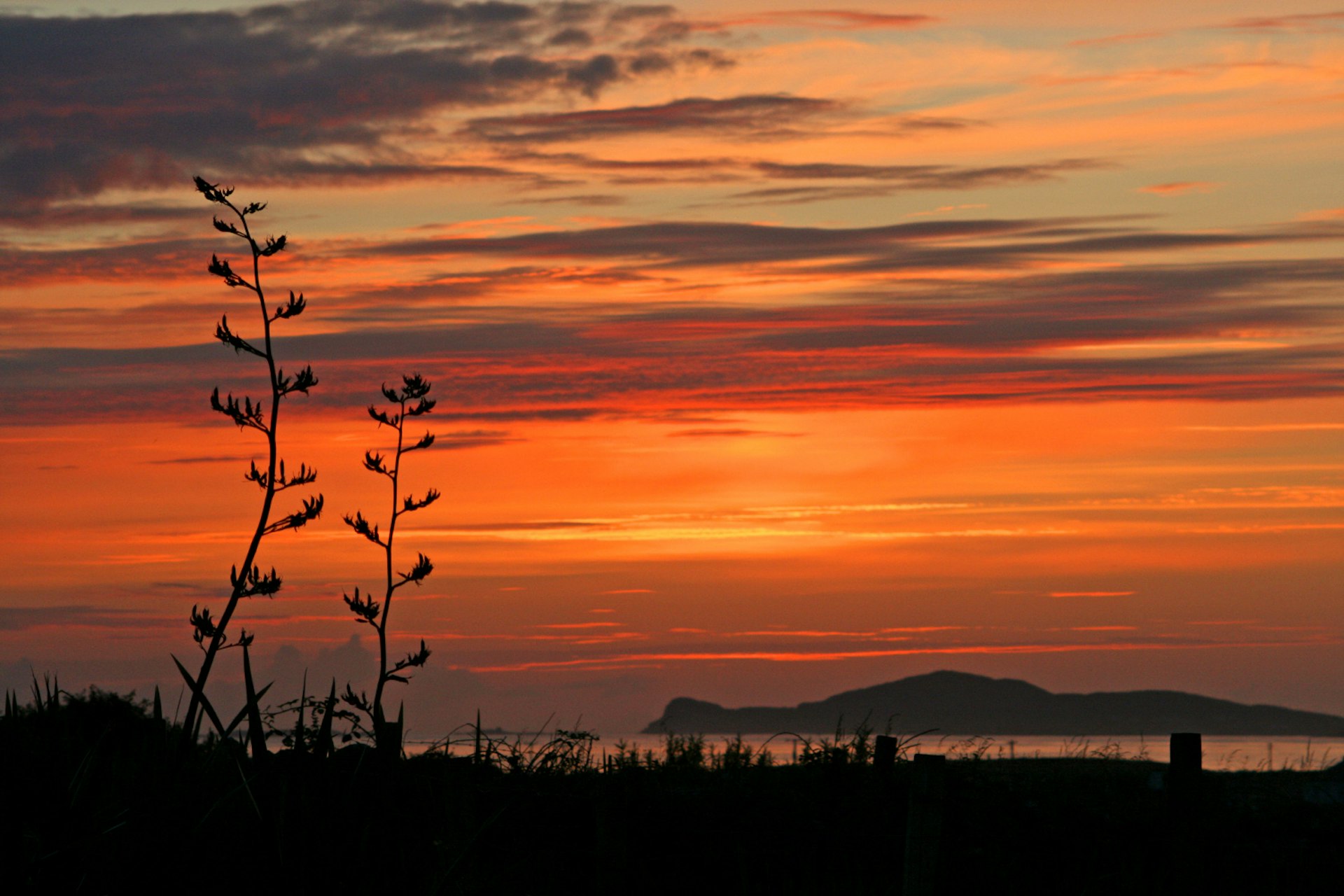 Sunset over Inishbofin, seen from Cleggan. Image by Bert Kaufman / CC BY-SA 2.0