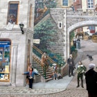 The Fresque des Québécois tells the story of Québec City’s history. Image by MANIN Richard / hemis.fr / Getty