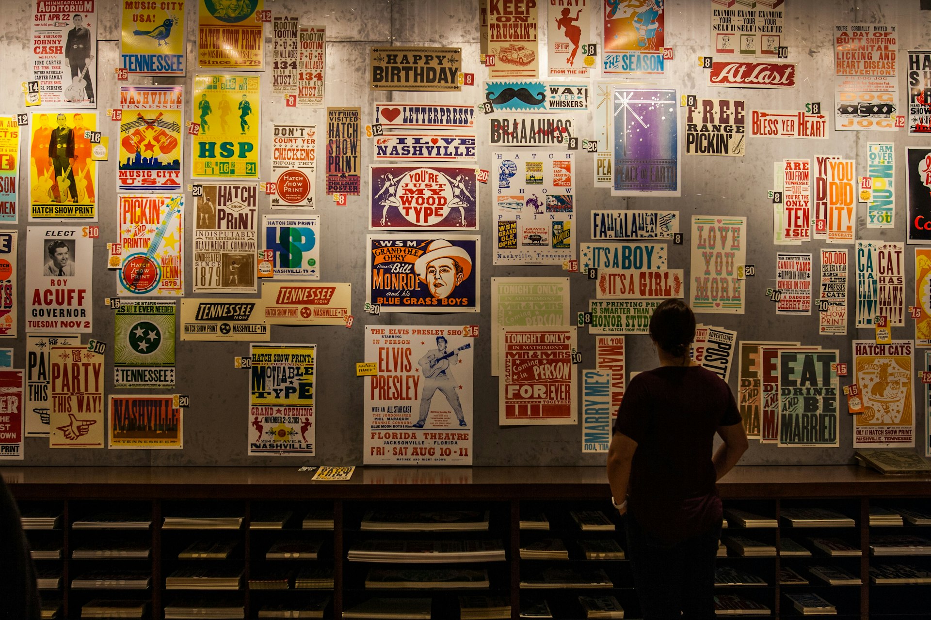 Perusing the prints at Hatch Show Print. Image by Alexander Howard / Lonely Planet