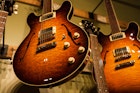 Features - Classic guitars on a wall. Image by Alexander Howard / Lonely Planet