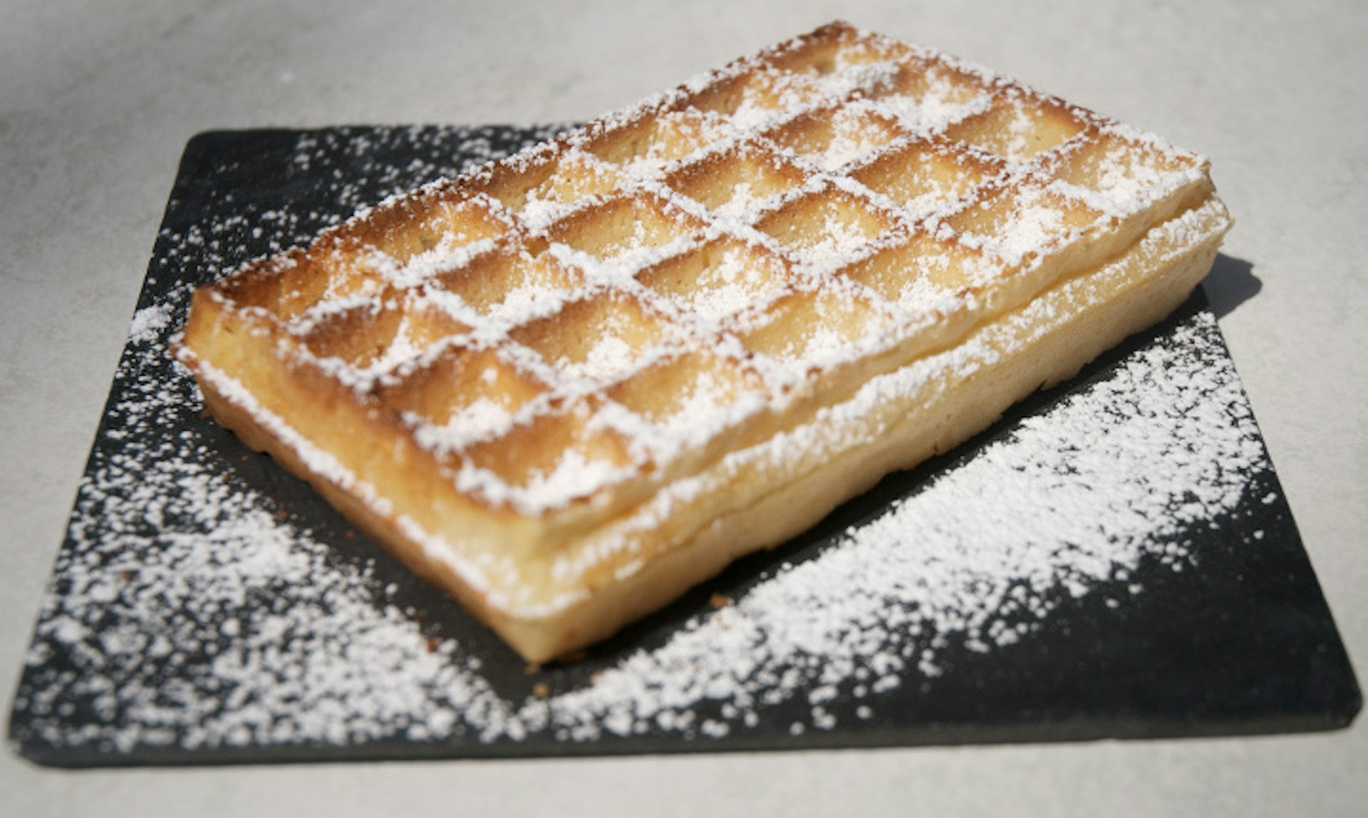 Tuck into a classic Belgian treat at Mokafé. Image by Helena Smith/Lonely Planet
