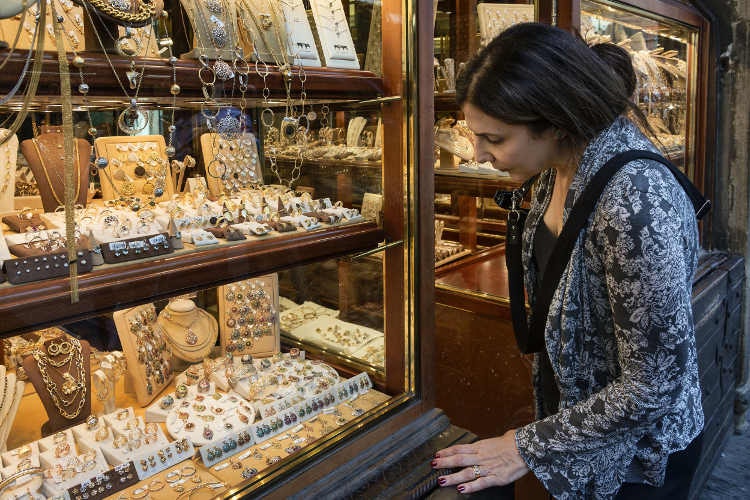 Jewellery shopping along the Ponte Vecchio. Image by John Greim / LightRocket / Getty Images