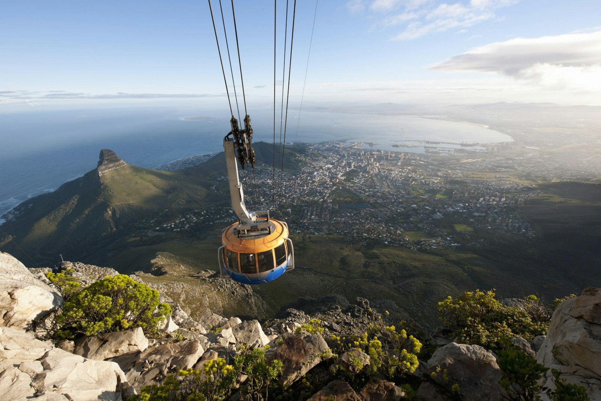 An elevated view of the Table Mountain Cable Car descending from the top of Table Mountain, Cape Town, Western Cape, South Africa
