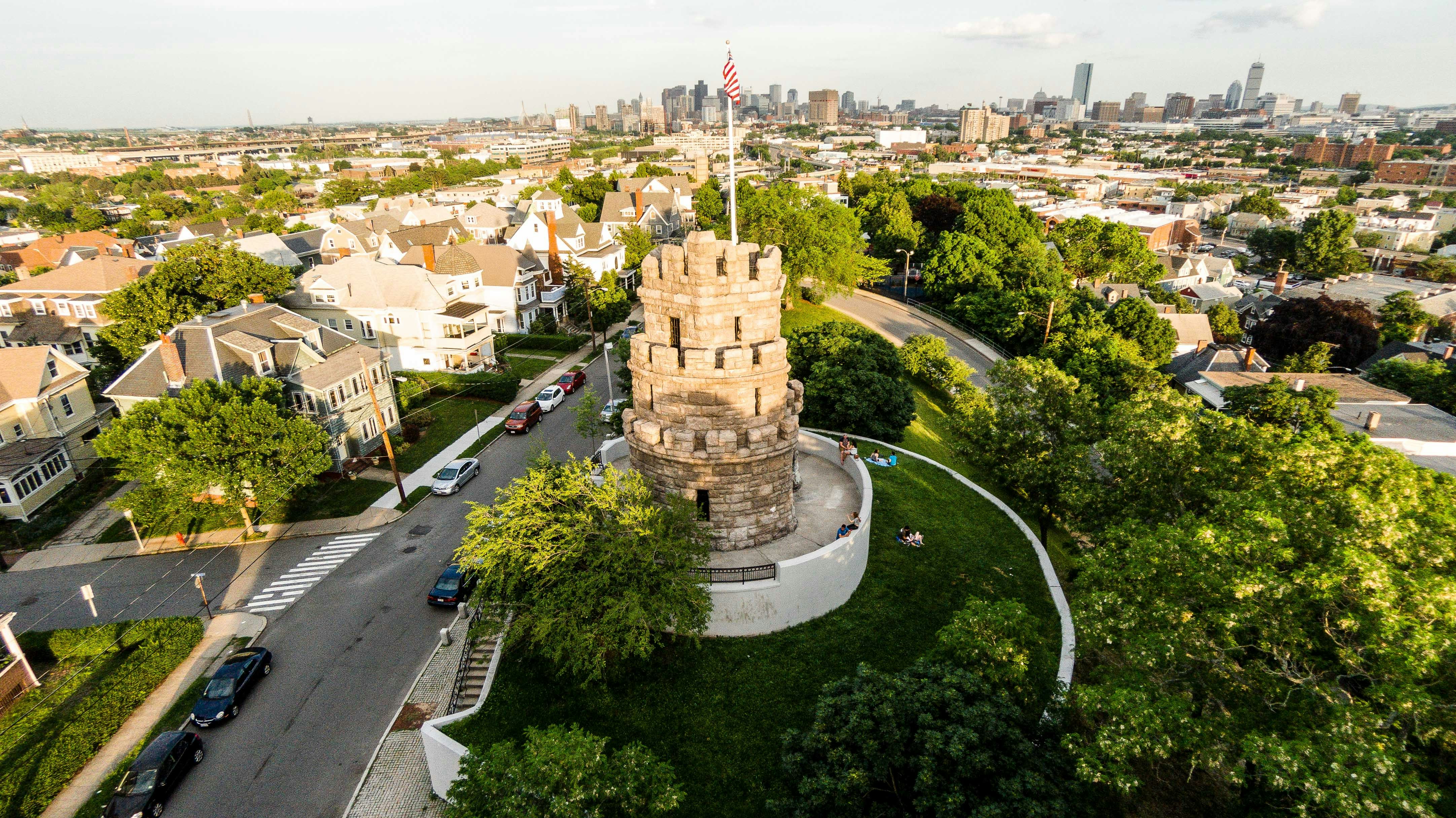 Prospect Hill Tower in Somerville with a view of the Boston skyline. Image by Eric Kilby / CC BY-SA 2.o