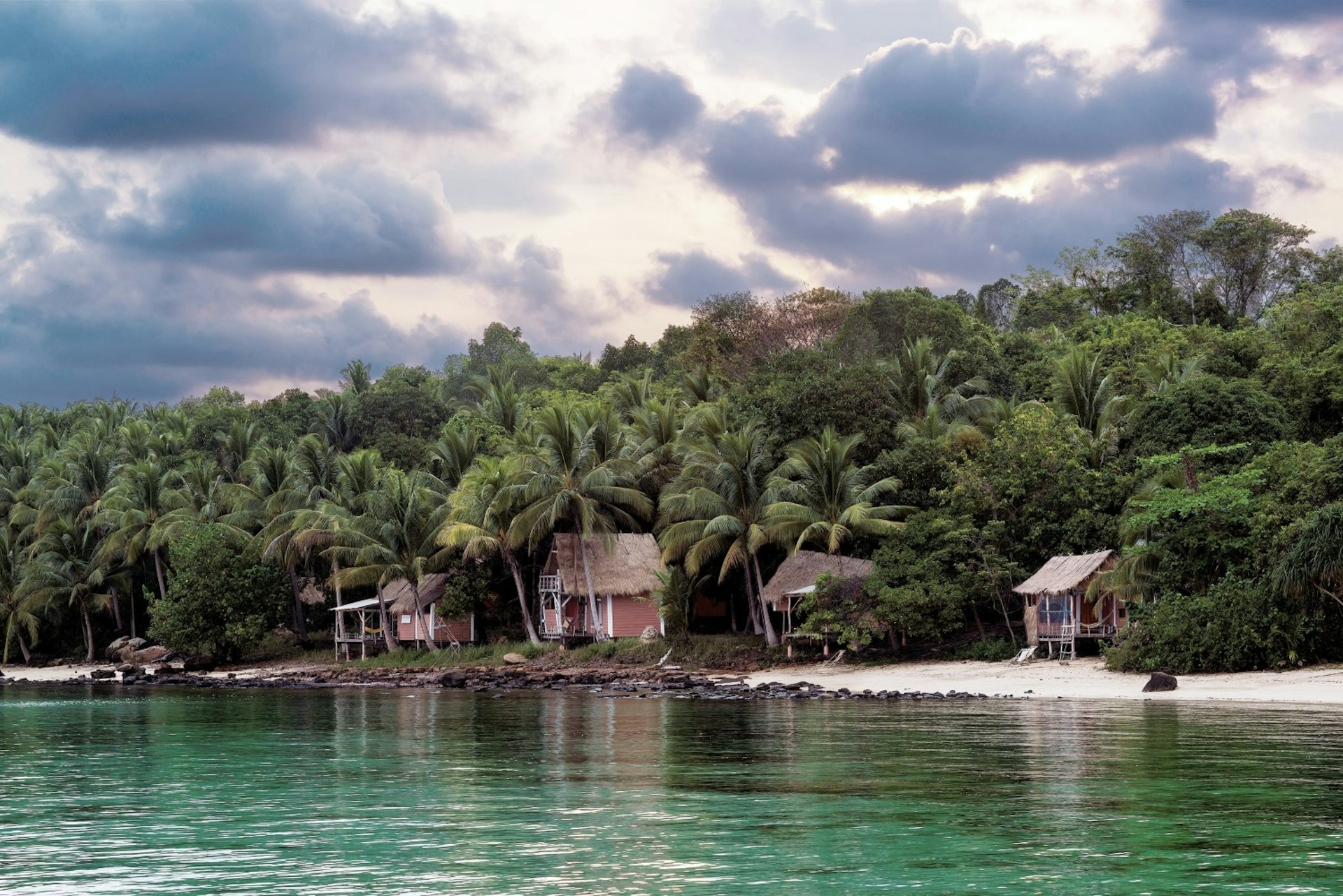 Beachside bungalows at Nomads Land resort, Koh Totang
