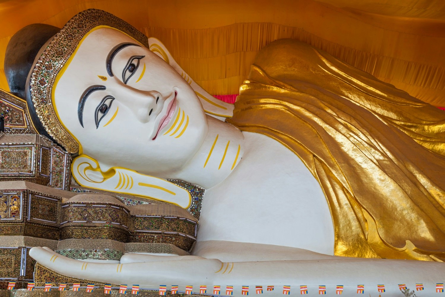 Close up of the reclining Shwethalyaung Buddha, Bago