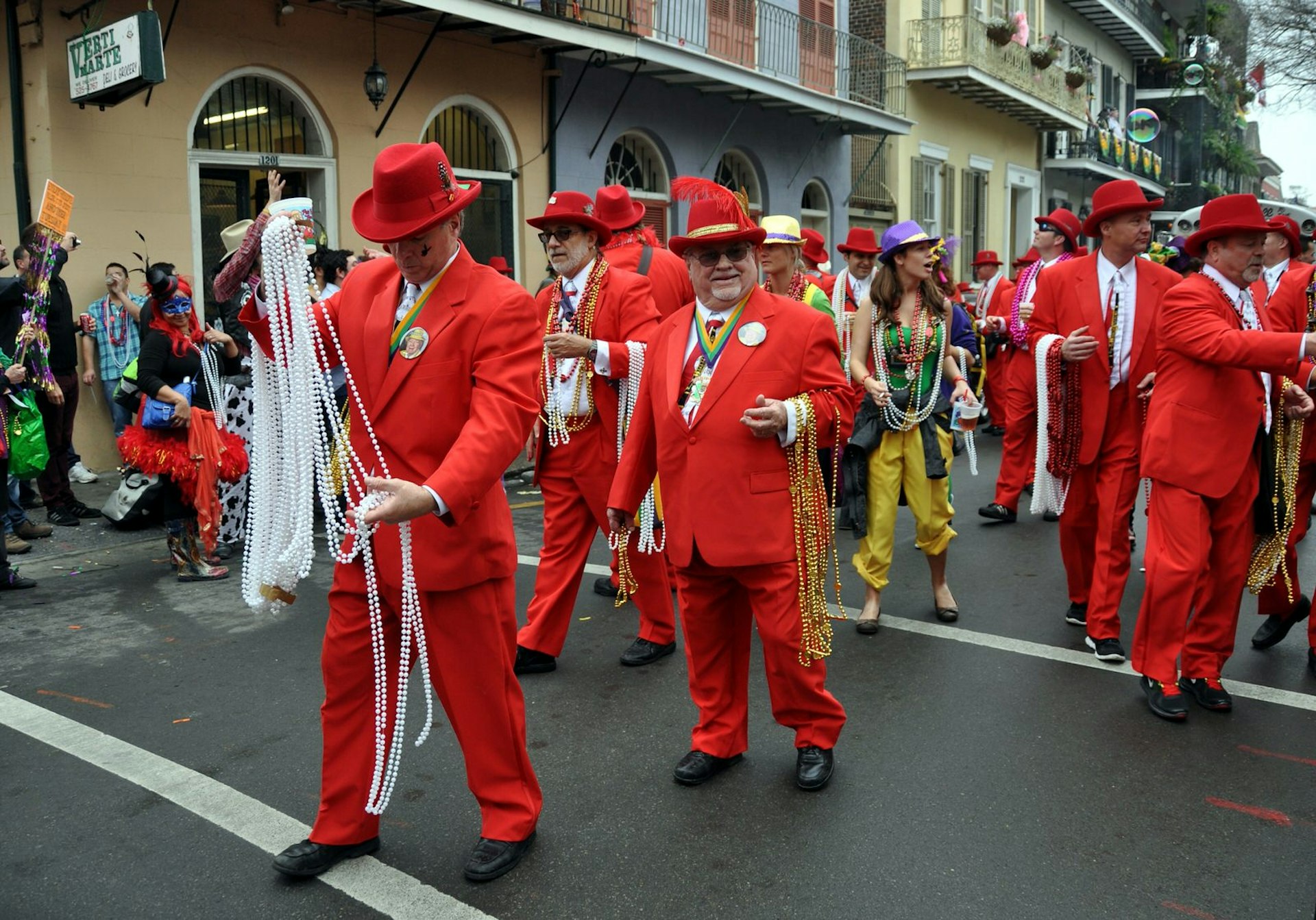 A Mardi Gras parade on Bourbon Street in New Orleans' French Quarter