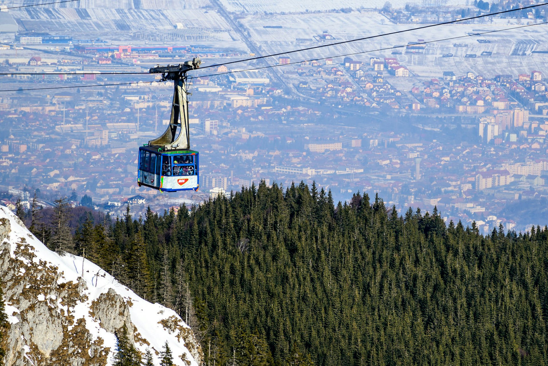 View over Braşov from the cable car at Poiana Braşov ski resort © Emi Cristea / Shutterstock