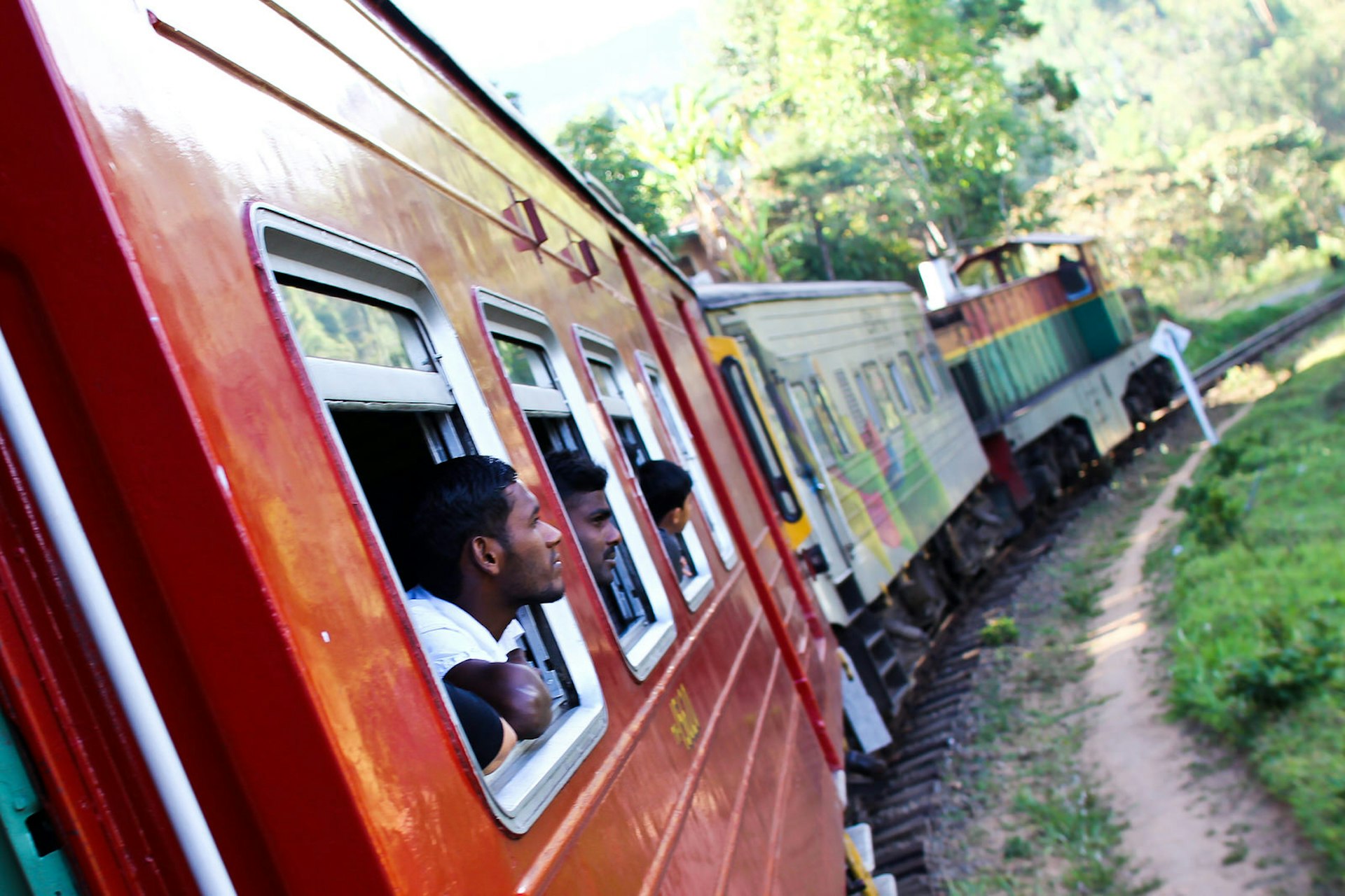 Taking in the views from the Badulla to Colombo train in central Sri Lanka © David M Byrne / Getty Images