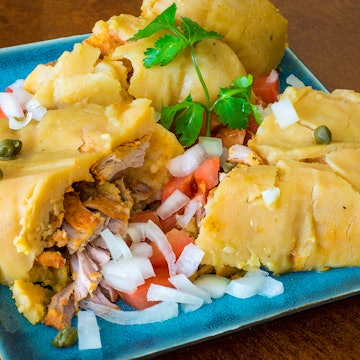 Features - Nacatamales or naca tamales a corn dough dish traditional of