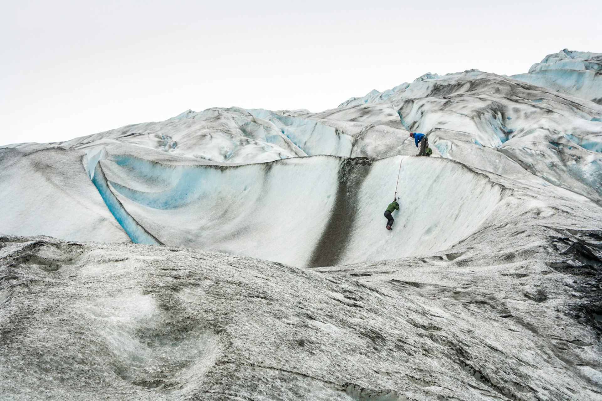 Ice climbers tackling a face of Exit Glacier © Alexander Howard / Lonely Planet