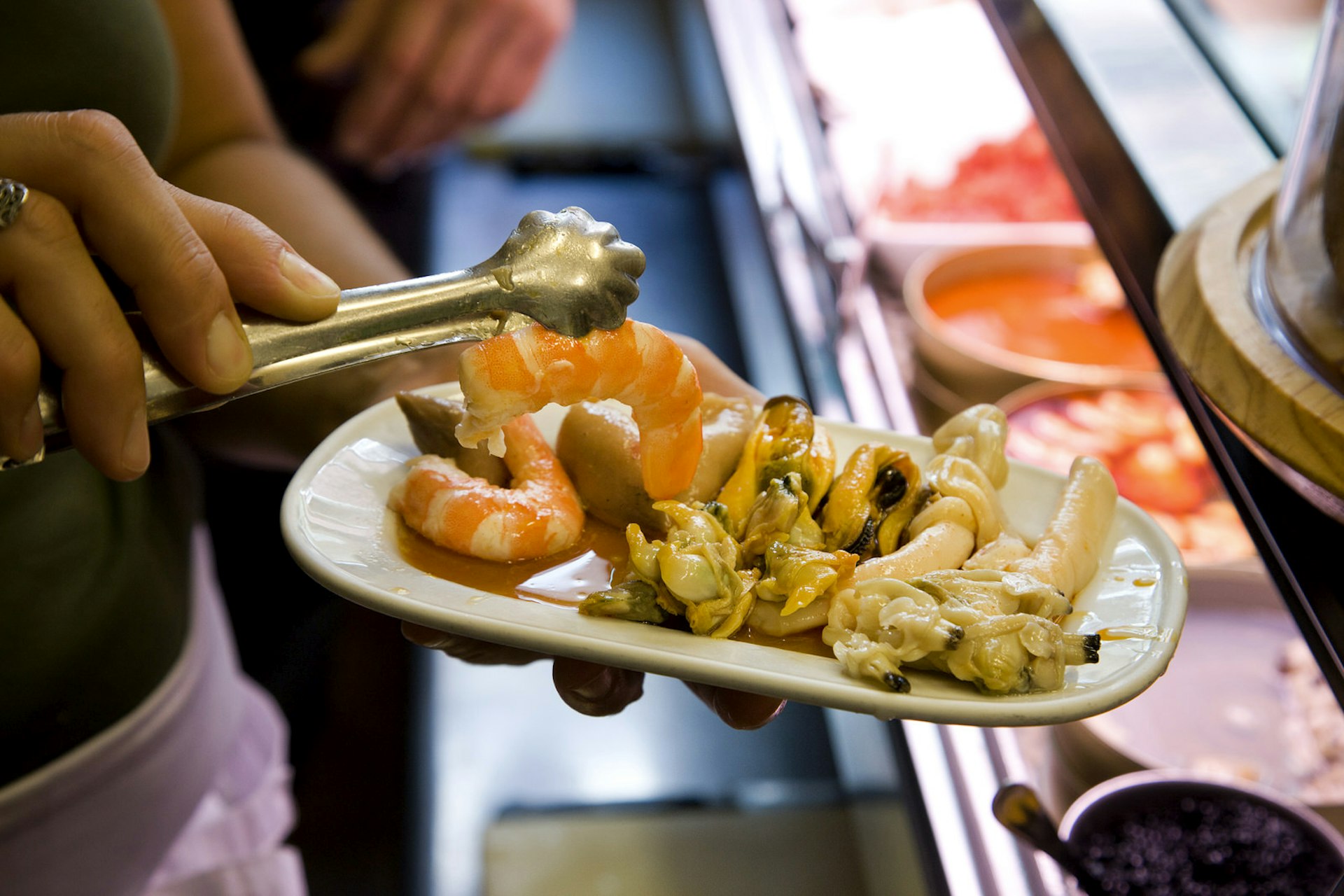 A plate of seafood tapas in Barcelona ©Michael Heffernan/Lonely Planet 