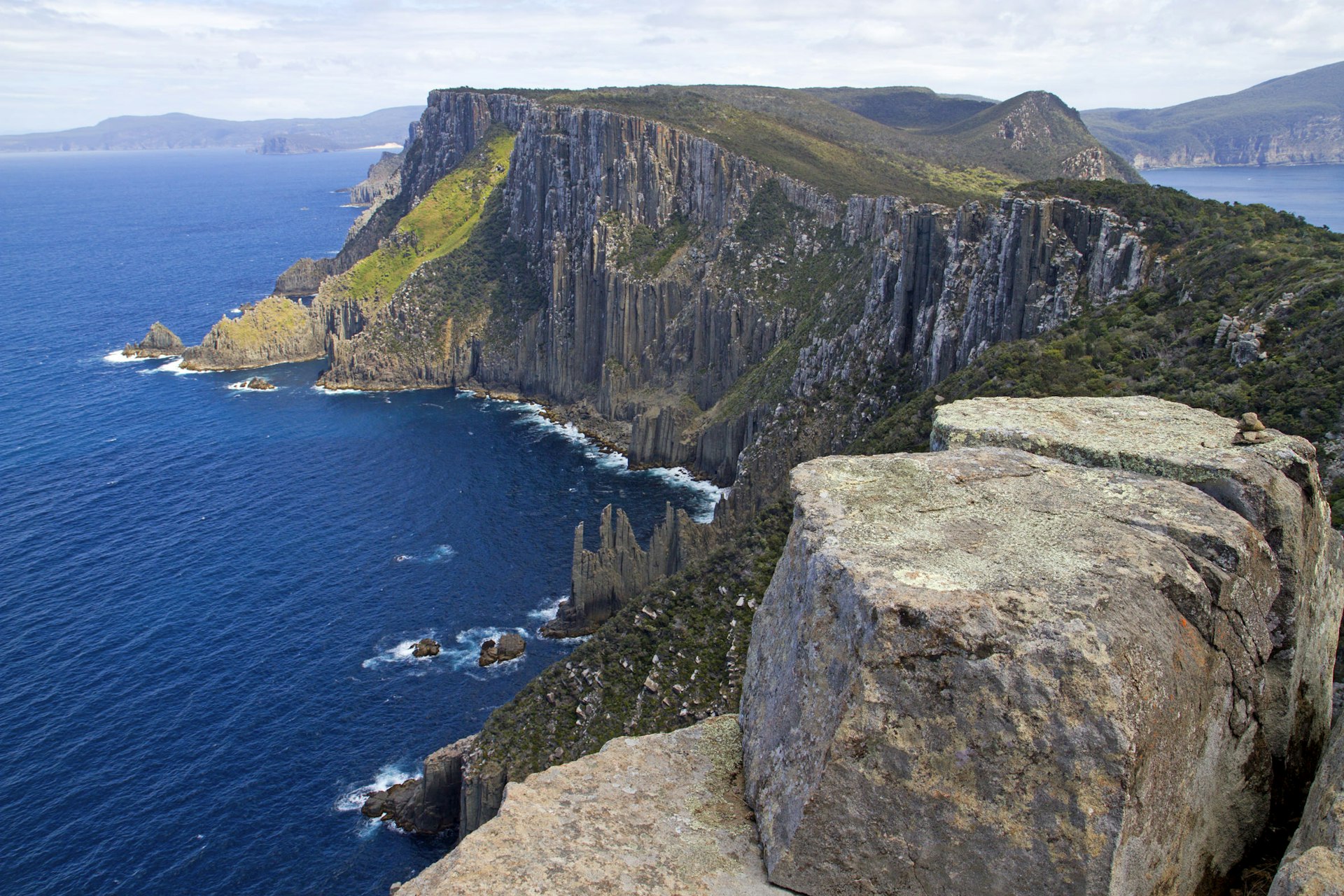 The dolerite cliffs along which the Three Capes Track journeys near Cape Pillar © Andrew Bain / Lonely Planet