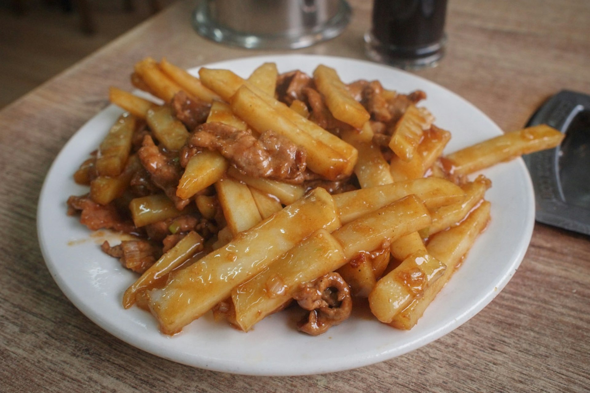 No cheese curds for these 'Kazakh style potatoes'. Image by Tom O'Malley / Lonely Planet