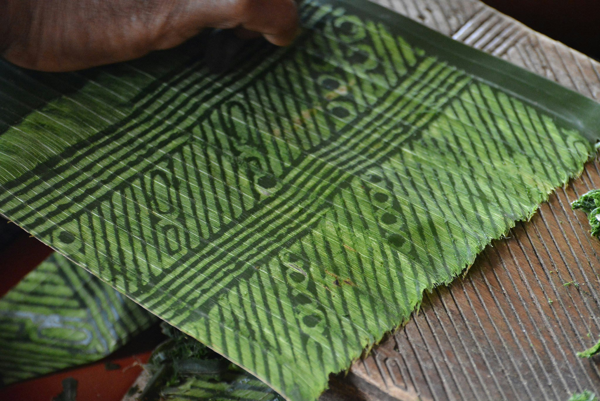 Patterned weave seen on the Trobriand Islands © Anna Kaminiski / Lonely Planet