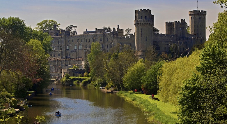 Warwick Castle sits on a bend of the River Avon © Andrea Pucci / Getty Images