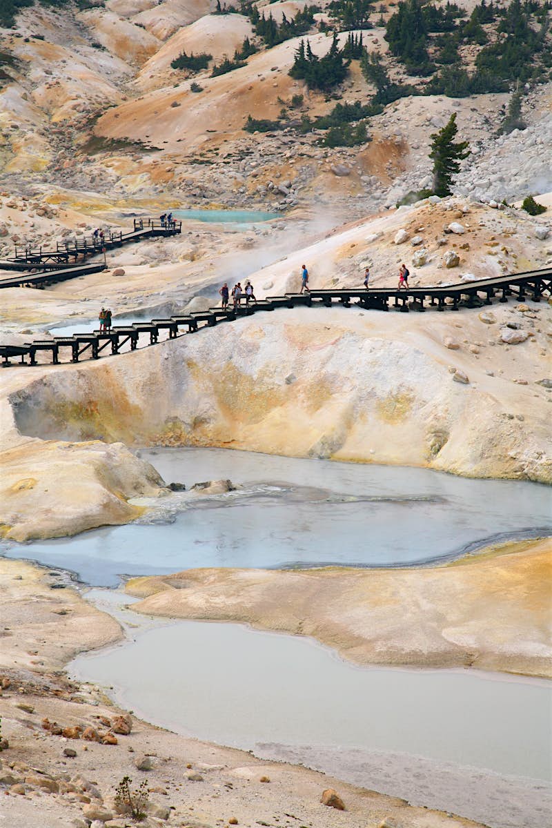Features - Bumpass Hell in Lassen National Park Visitors safety boardwalk among the Mud, ash and sulfur-rich ponds and fumaroles of Bumpass Hell in Lassen Volcanic National Park.