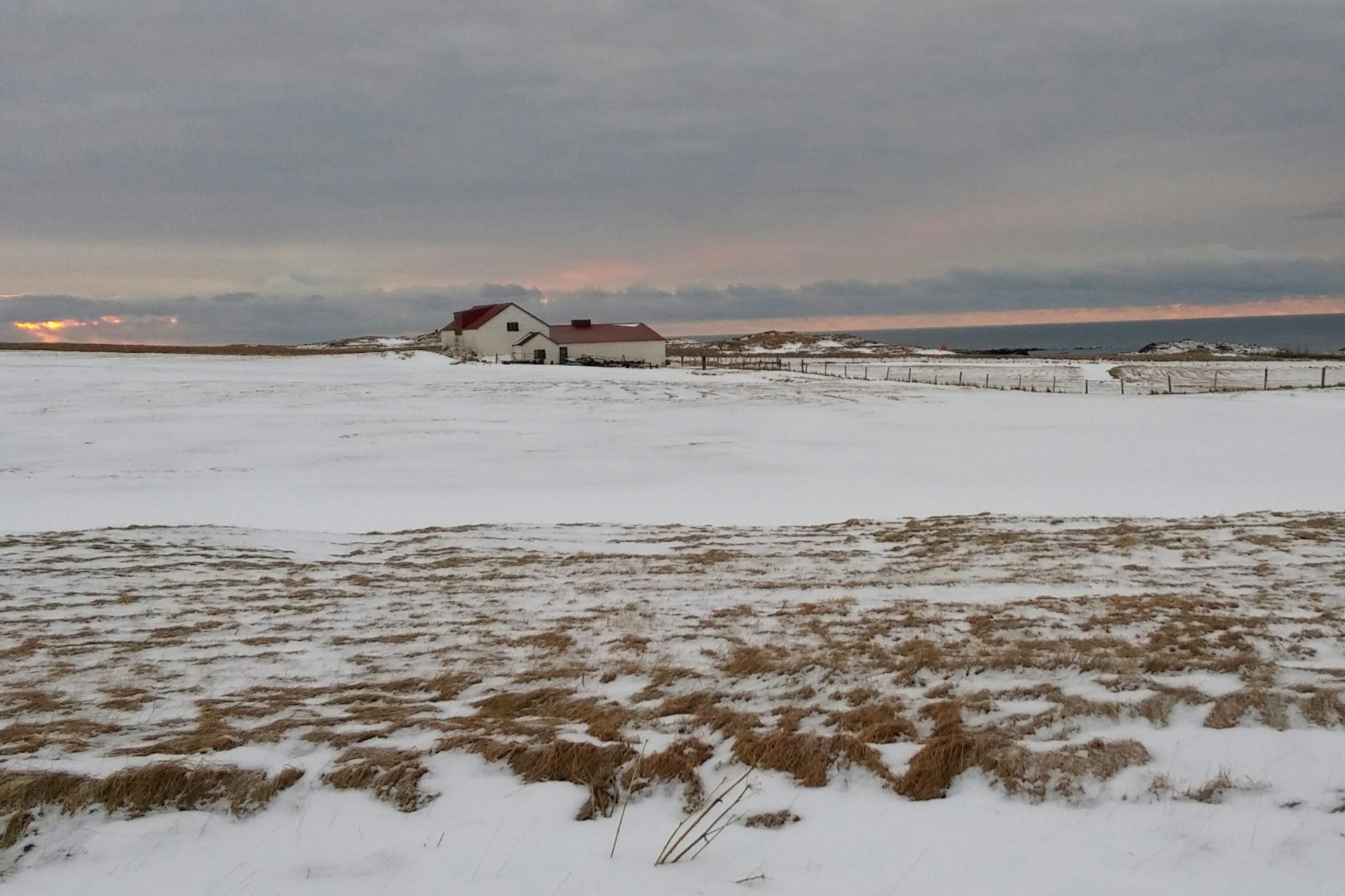 Snow and sea stretch out from Berunes hostel at dawn © James Smart / Lonely Planet