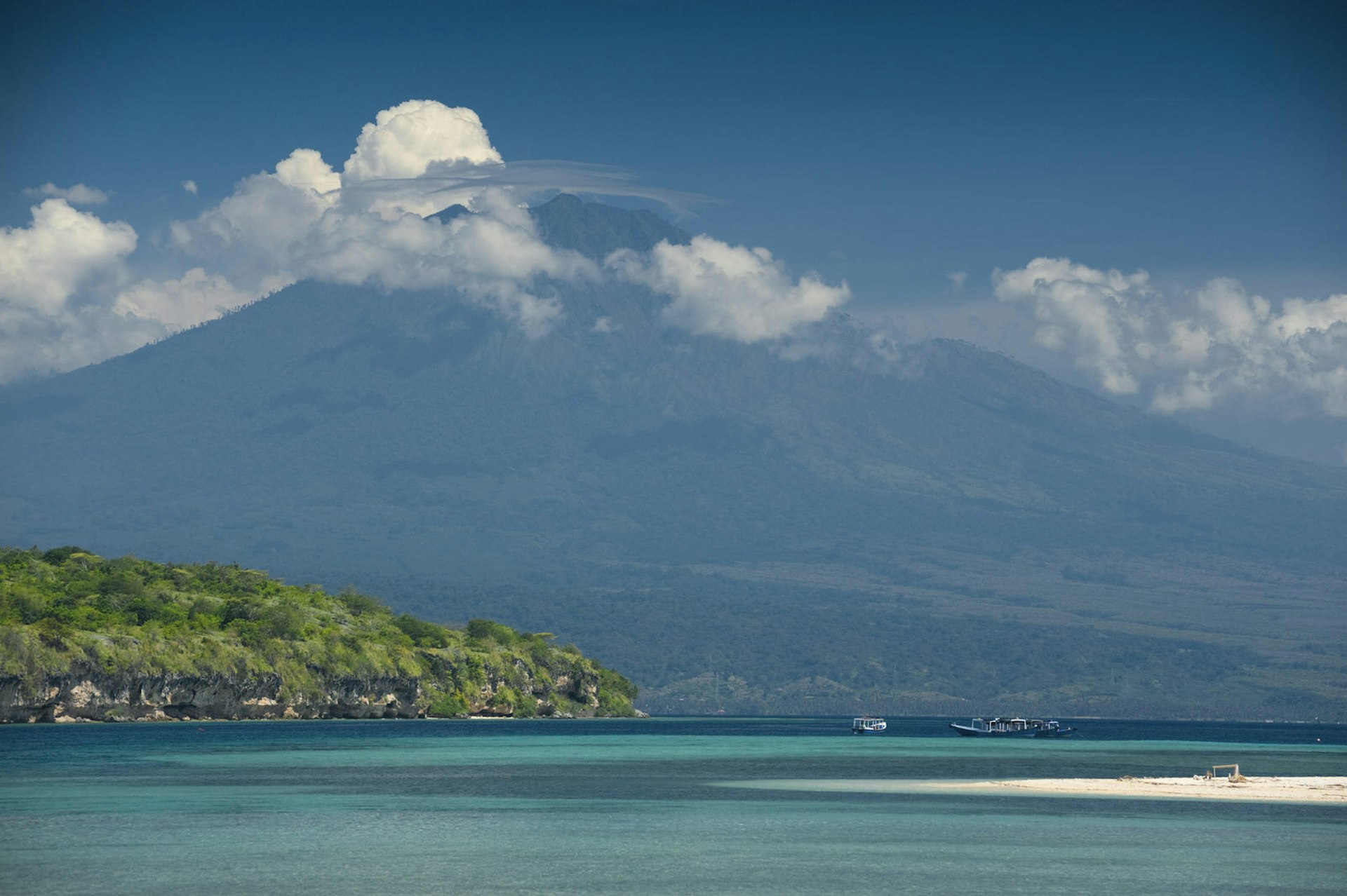 Ijen Volcano rising above Menjangan Island, offshore from Pemuteran © LoweStock / Getty Images