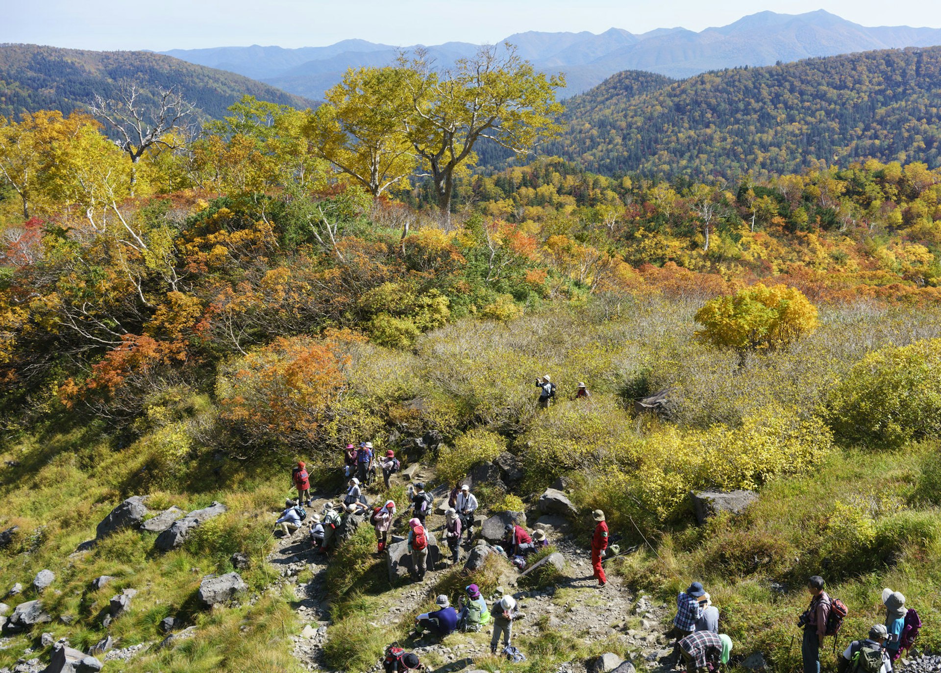 Japanese hikers on the Numa-Meguri trail in the spectacular Daisetsuzan National Park 