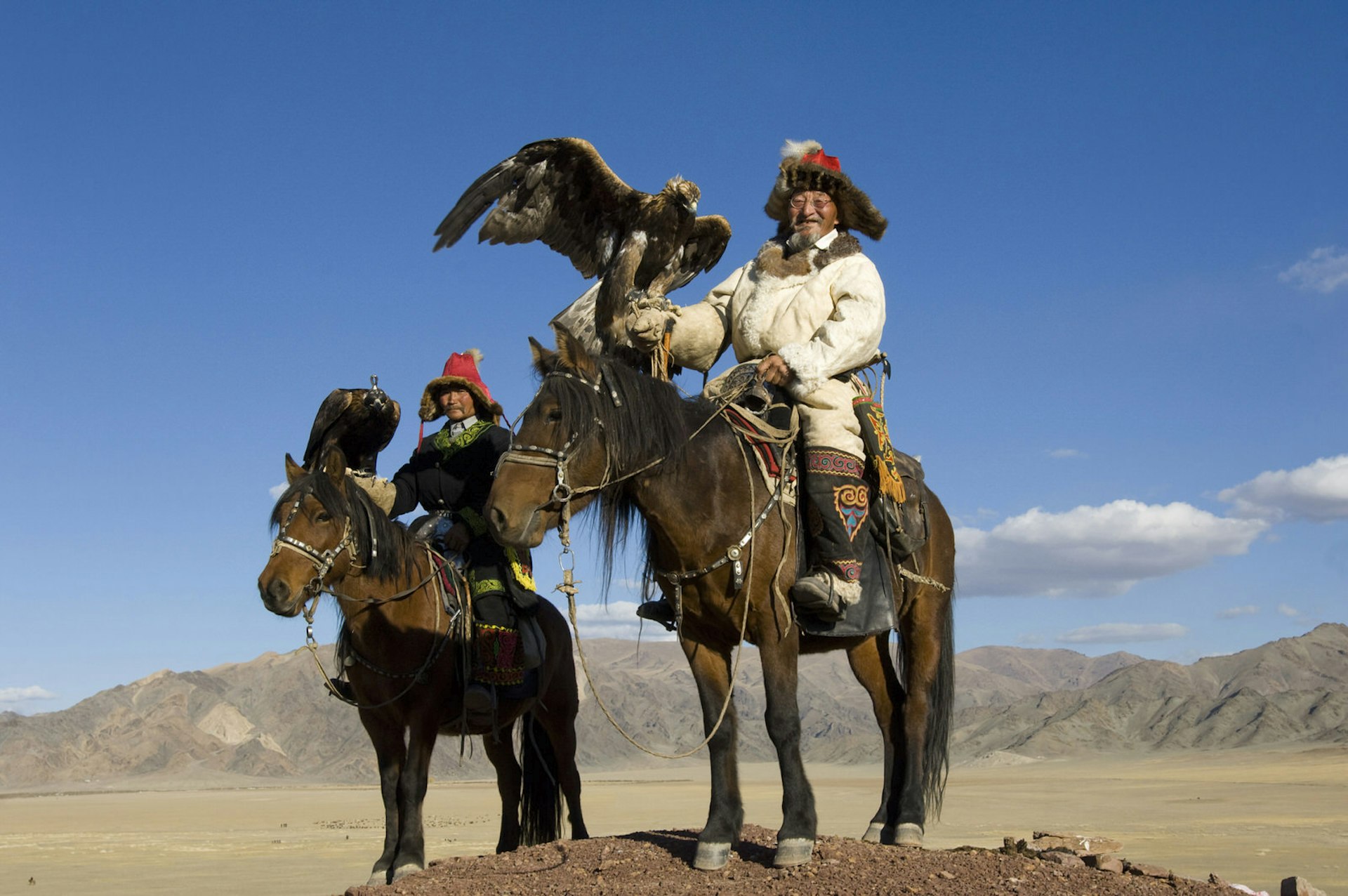 Kazakh men have used birds of prey to hunt in western Mongolia since the 15th century. Though it is threatened by the encroachment of globalization, the hunt remains an honorable tradition and rite of passage for the Kazakh men. Hunting with Eagles takes place in the winter, and the eagles are trained to hunt marmots, foxes and wolves.