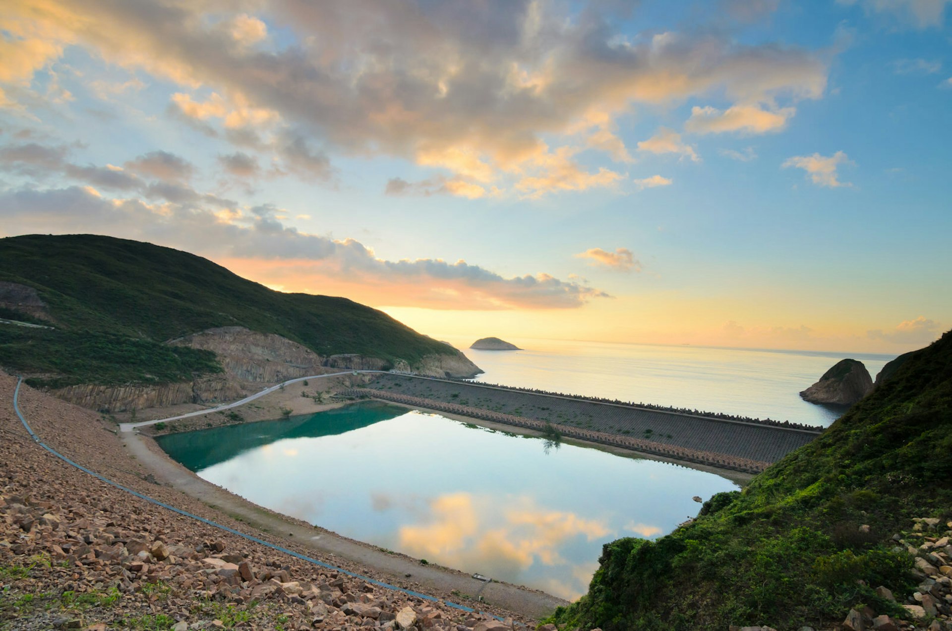East Dam of High Island Reservoir, beautiful colonial waterworks architecture © omepl1 / Shutterstock