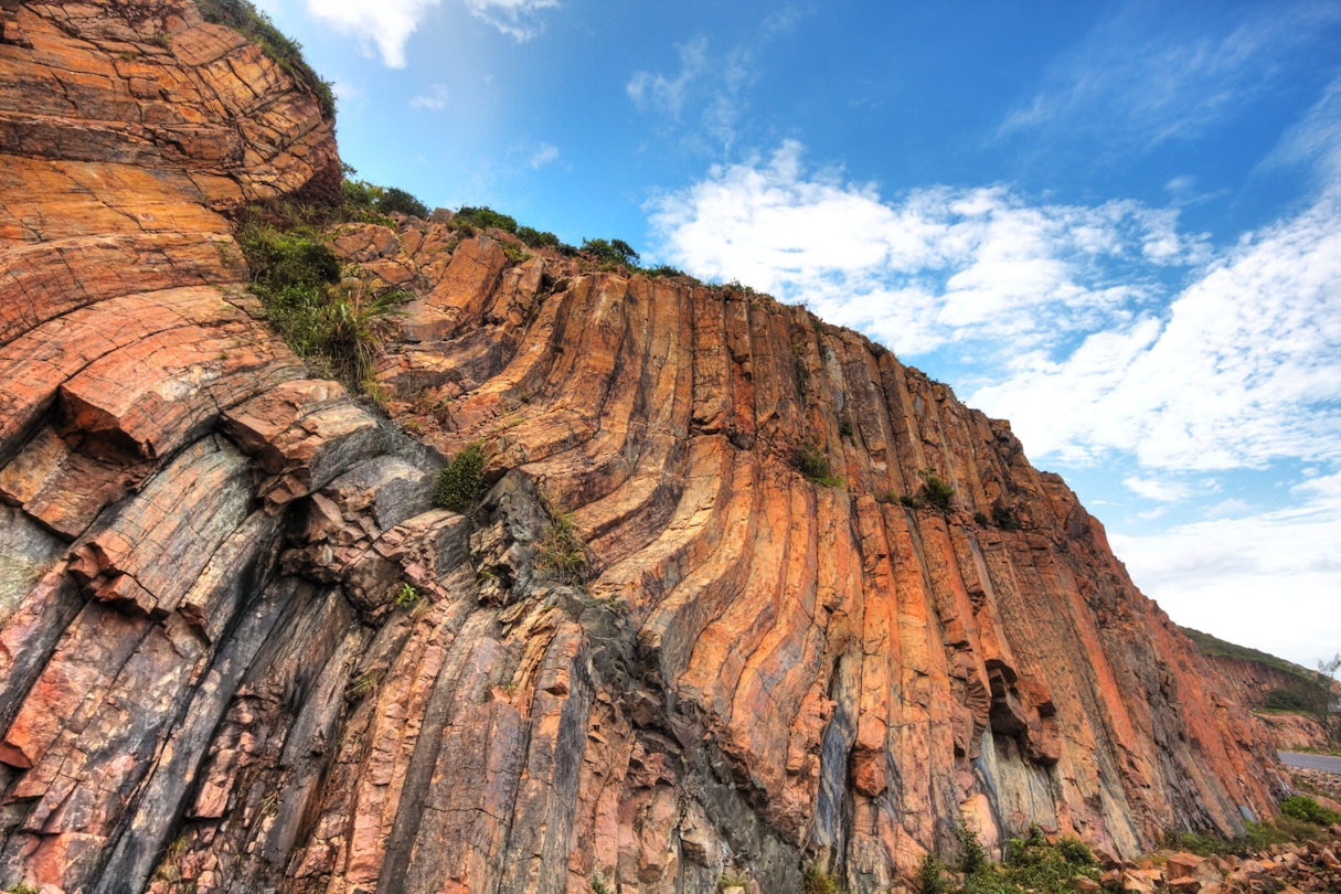 Natural hexagonal columns in ethereal colours at Hong Kong Global Geopark © cozyta / Shutterstock