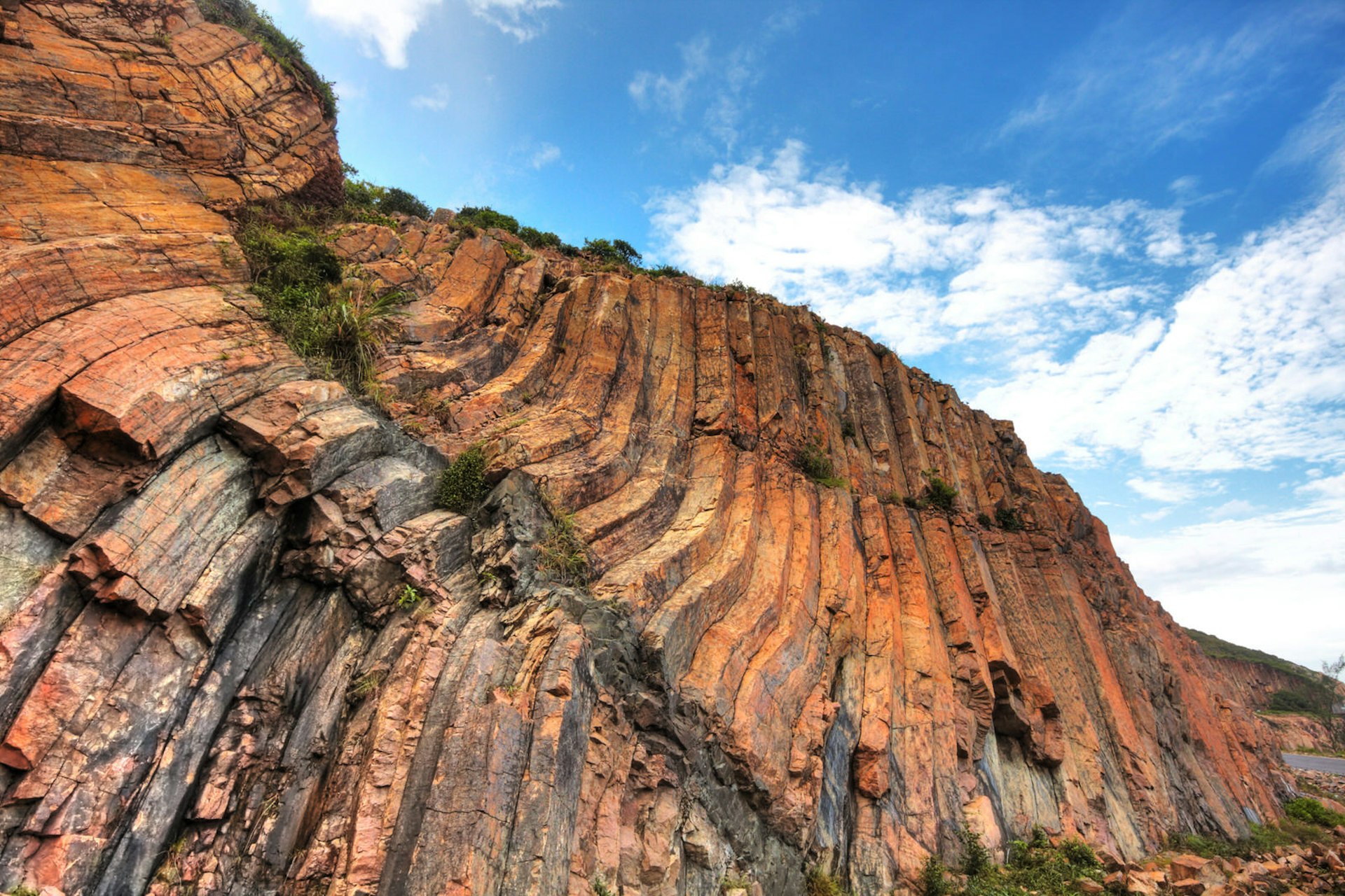 Natural hexagonal columns in ethereal colours at Hong Kong Global Geopark © cozyta / Shutterstock