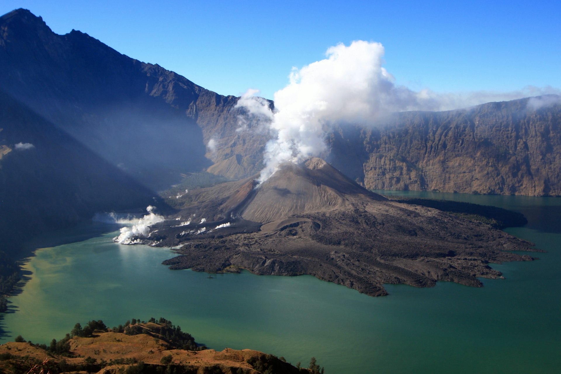 Mt Rinjani's ash emissions bring fertility to the island's rice fields and tobacco crops