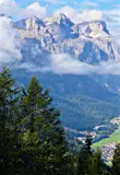 The dramatic Dolomites mountains tower over the Alta Badia valley
