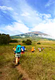 Visitors trek through Rinjani National Park