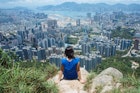 Features - Hiker enjoying the view in Hong Kong