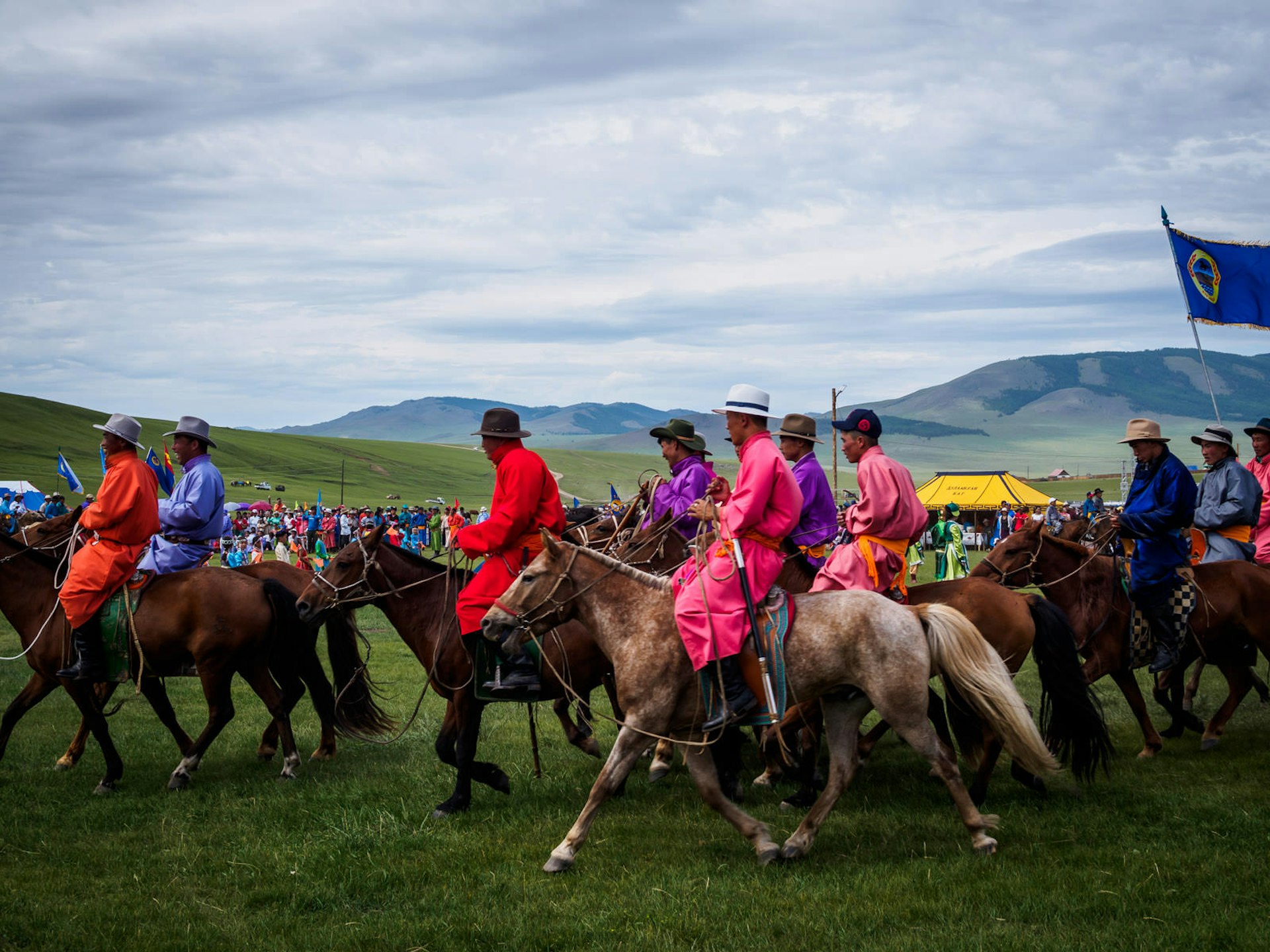 One of Mongolia's 'three manly sports' – horse riding during the Nadaam festival © Tom O'Malley / Lonely Planet