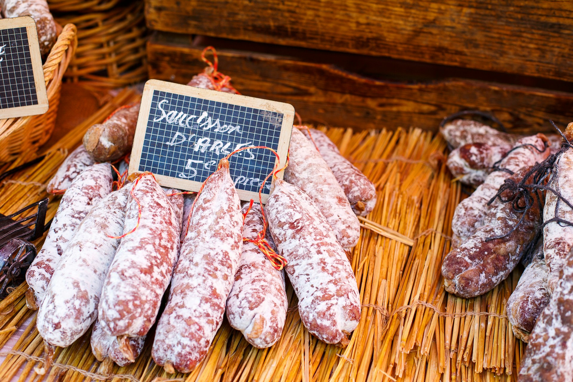 Saucissons for sale at Arles market. Image © romrodinka / iStock / Getty